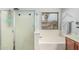 Bathroom with a bathtub, shower and tiled floors at 3528 E Tonto Dr, Gilbert, AZ 85298
