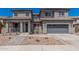 Charming two-story home with a well-maintained front yard and a two-car garage at 3528 E Tonto Dr, Gilbert, AZ 85298