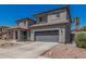 Inviting two-story home with a tile roof, a two-car garage, and low-maintenance landscaping at 3528 E Tonto Dr, Gilbert, AZ 85298