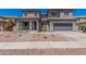 Charming two-story home with a well-maintained front yard and a two-car garage at 3528 E Tonto Dr, Gilbert, AZ 85298
