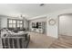 Spacious living room featuring a large sectional sofa, TV, and neutral color palette at 3528 E Tonto Dr, Gilbert, AZ 85298