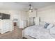 Spacious primary bedroom with ensuite bath and views into the closet and bathroom at 3528 E Tonto Dr, Gilbert, AZ 85298