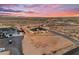Spacious desert property boasting a modern home and extended driveway with stunning mountain views at 35280 N Bell Rd, Queen Creek, AZ 85144