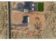 An aerial view showing two modern homes with spacious lots in a desert landscape, connected by a paved road at 35280 N Bell Rd, Queen Creek, AZ 85144