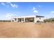 Back of the home featuring an expansive patio and desert landscaping at 35280 N Bell Rd, Queen Creek, AZ 85144
