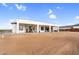 Modern single story home, desert landscaping, and covered patio at 35280 N Bell Rd, Queen Creek, AZ 85144