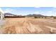 Expansive backyard with desert landscape and mountain views offering ample space for outdoor activities at 35280 N Bell Rd, Queen Creek, AZ 85144