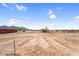 Expansive backyard with desert landscape and mountain views offering ample space for outdoor activities at 35280 N Bell Rd, Queen Creek, AZ 85144