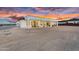 Modern backyard patio features a large covered space perfect for outdoor living and entertaining at 35280 N Bell Rd, Queen Creek, AZ 85144