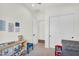 Playroom area with reading nook and closet space at 35280 N Bell Rd, Queen Creek, AZ 85144