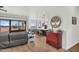 Open concept living area features modern kitchen and an outdoor patio with sliding glass doors at 35280 N Bell Rd, Queen Creek, AZ 85144