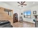 Bright office with wood-look floors, ample natural light, and comfortable massage chair at 35280 N Bell Rd, Queen Creek, AZ 85144