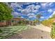 Beautiful backyard featuring a pool, patio, lounge chairs, and lush landscaping for outdoor enjoyment at 3954 E Becker Ln, Phoenix, AZ 85028