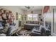 Stylish bedroom featuring a day bed, unique wall art, and modern decor at 3954 E Becker Ln, Phoenix, AZ 85028