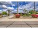 Charming single-story home featuring mature landscaping, flowering bushes, and a well-maintained lawn at 3954 E Becker Ln, Phoenix, AZ 85028