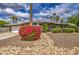Charming single-story home featuring mature landscaping, a stone walkway and well-maintained lawn at 3954 E Becker Ln, Phoenix, AZ 85028