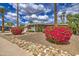 Well-maintained home with mature landscaping, featuring a stone walkway and drought-resistant desert landscaping at 3954 E Becker Ln, Phoenix, AZ 85028