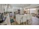 Bright kitchen features granite counters, stainless appliances, and island with breakfast bar at 3954 E Becker Ln, Phoenix, AZ 85028