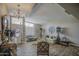 Bright living room with tile floors, decor, and ample seating at 3954 E Becker Ln, Phoenix, AZ 85028