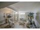 Living room features wood-look flooring, ample seating, and stylish decor elements at 3954 E Becker Ln, Phoenix, AZ 85028