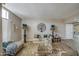 Spacious living room with ample seating, stylish decor, and wood-look flooring at 3954 E Becker Ln, Phoenix, AZ 85028