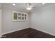 Cozy bedroom with hardwood floors, natural light, and neutral wall color at 4201 N 35Th St, Phoenix, AZ 85018