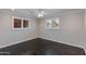 Bright bedroom with hardwood floors and shuttered windows at 4201 N 35Th St, Phoenix, AZ 85018
