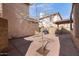 Backyard featuring tiled patio, mature tree, and outdoor space for relaxing or entertaining at 4212 W Jason Dr, Glendale, AZ 85308