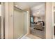 Ensuite bathroom with step-in shower, open to large bedroom/living space at 4212 W Jason Dr, Glendale, AZ 85308