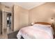 Bedroom features a bed, closet and entry door at 4212 W Jason Dr, Glendale, AZ 85308