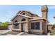 Charming two-story home featuring unique architectural details and a two-car garage at 4212 W Jason Dr, Glendale, AZ 85308