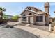 Charming two-story home featuring unique architectural details and a two-car garage at 4212 W Jason Dr, Glendale, AZ 85308