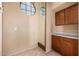Hallway niche with storage cabinet and a mirror at 4212 W Jason Dr, Glendale, AZ 85308