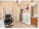 Bright office with tiled floors and a white storage cabinet at 4212 W Jason Dr, Glendale, AZ 85308