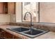 Kitchen sink features a double basin and a large window providing natural light at 4212 W Jason Dr, Glendale, AZ 85308