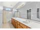 Traditional bathroom features a double sink vanity and tile flooring at 4223 N St Elias --, Mesa, AZ 85215