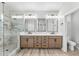 Beautiful bathroom featuring a double vanity, glass shower, and modern fixtures for a luxurious experience at 4223 N St Elias --, Mesa, AZ 85215