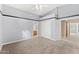 Generously sized bedroom featuring plush carpeting, a ceiling fan, and a walk-in closet at 4223 N St Elias --, Mesa, AZ 85215