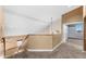 Upstairs hallway with carpet flooring and views of the living space below at 4223 N St Elias --, Mesa, AZ 85215