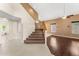 Inviting living room showcasing a staircase, tile flooring, and ample natural light at 4223 N St Elias --, Mesa, AZ 85215