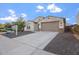 Charming single-story home with a two-car garage and low-maintenance landscaping at 4360 N 186Th Ln, Goodyear, AZ 85395