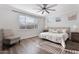 Bright main bedroom with generous natural light and wood-look flooring at 4360 N 186Th Ln, Goodyear, AZ 85395