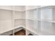Spacious walk-in pantry with custom shelving offering ample storage at 4360 N 186Th Ln, Goodyear, AZ 85395