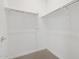 Walk-in closet with built-in shelving at 4777 W Hunter Trl, San Tan Valley, AZ 85144