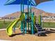 Bright playground with slides, climbing structures, and views of surrounding mountain landscape at 4777 W Hunter Trl, San Tan Valley, AZ 85144