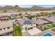Beautiful home featuring desert landscaping, a tile roof with solar panels, and a spacious driveway at 5557 W Mine Trl, Phoenix, AZ 85083