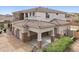 Charming home featuring multi-car garage, appealing stonework, and port cochere at 5557 W Mine Trl, Phoenix, AZ 85083