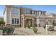 Charming home featuring beautiful landscaping and covered entryway at 5557 W Mine Trl, Phoenix, AZ 85083
