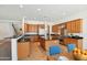 Bright kitchen with stainless steel appliances, center island, and tile flooring at 5557 W Mine Trl, Phoenix, AZ 85083