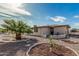 Palm tree and desert landscaping in the backyard of home at 6722 E El Paso St, Mesa, AZ 85205
